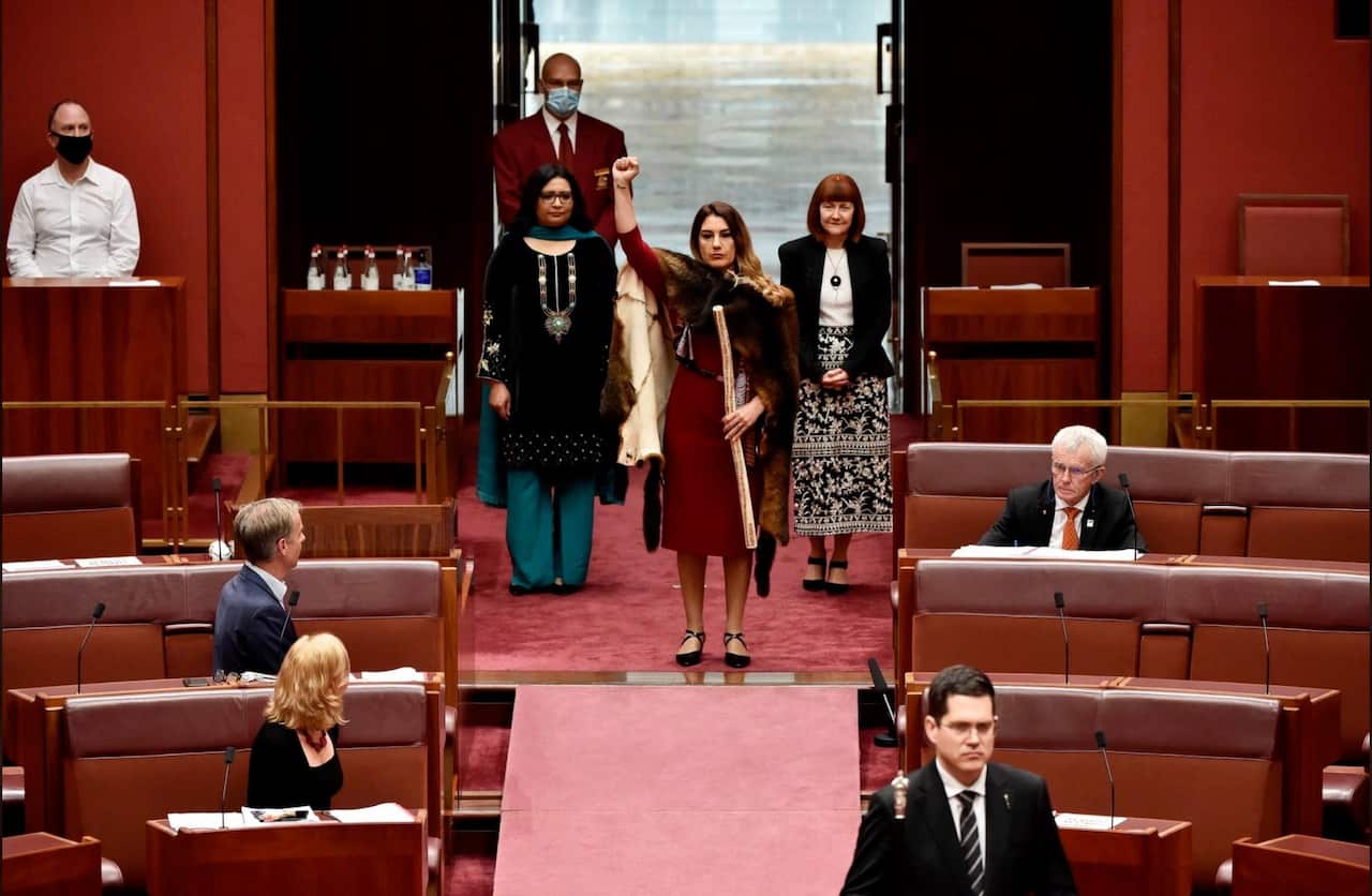 Victorian Greens Senator Lidia Thorpe enters Senate Chamber.