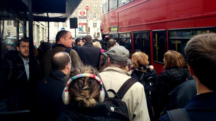 crowded bus stop