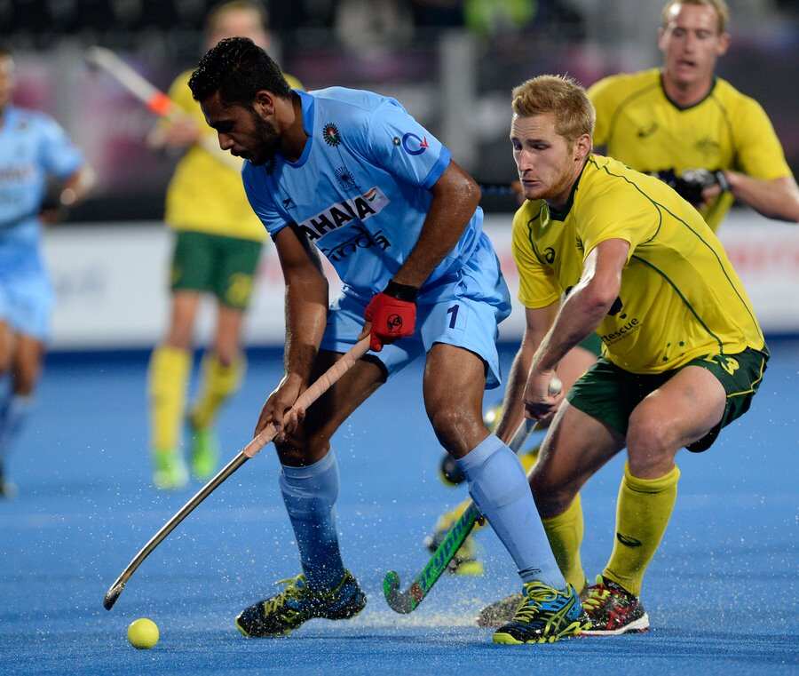 Australia's Daniel Beale closes down India's Harmanpreet Singh during the Champions Trophy Final at Lee Valley Hockey and Tennis Centre, Stratford, east London, 17th June 2016.