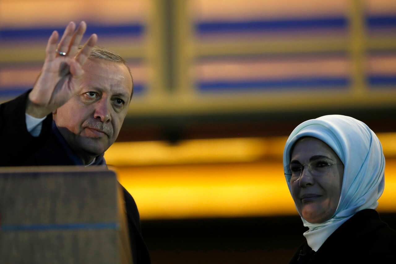 Turkish President Recep Tayyip Erdogan (L) and his wife Emine Erdogan (R)