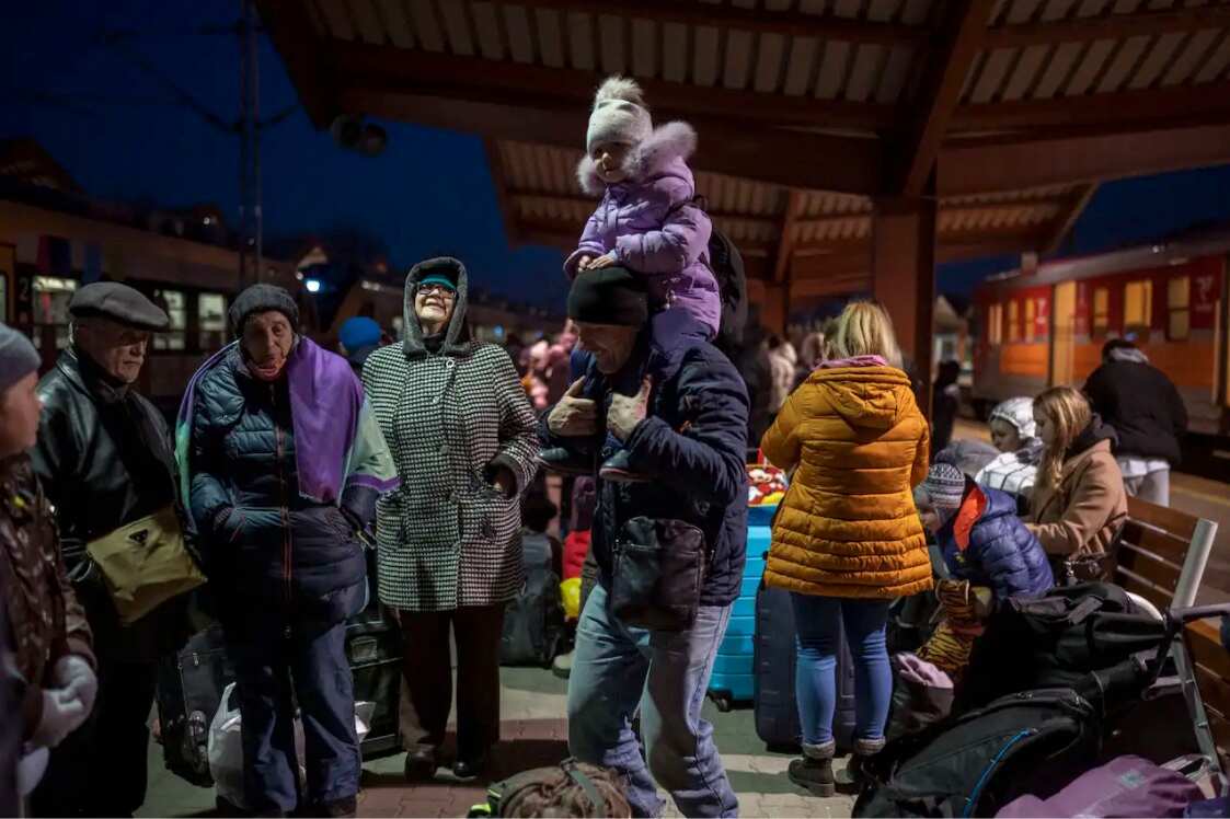 People who fled the war in Ukraine wait at the train station in Przemysl, southeastern Poland, on Thursday, 17 March, 2022.