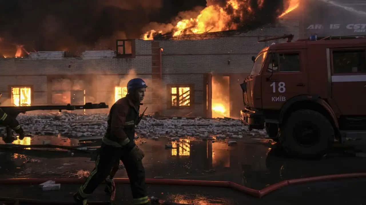 A Ukrainian firefighter at a warehouse that caught fire after a bombing in Kyiv, Ukraine, on Thursday, 17 March, 2022.