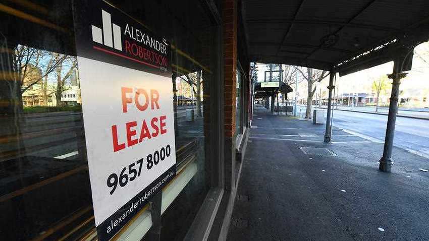 A for lease sign is seen on the exterior of a closed business along Lygon street in Melbourne.