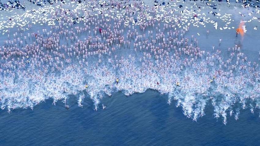 Almost 2000 people have taken part in the Dark Mofo Nude Solstice Swim in Hobart.
