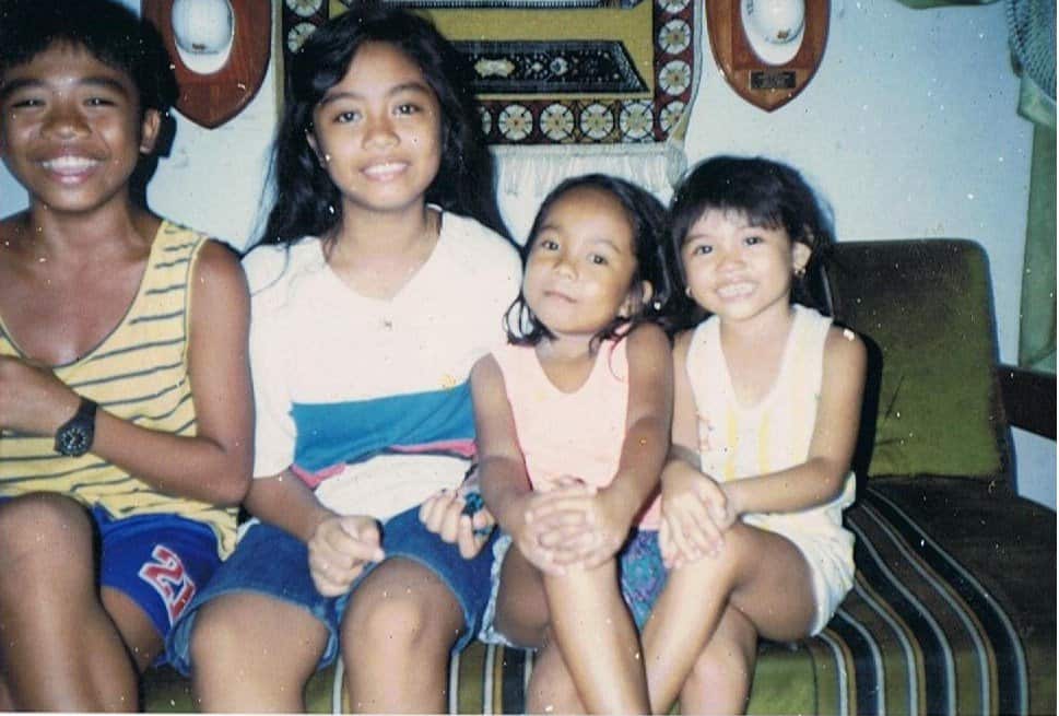 A young Regina Meehan in Olongapo with friends