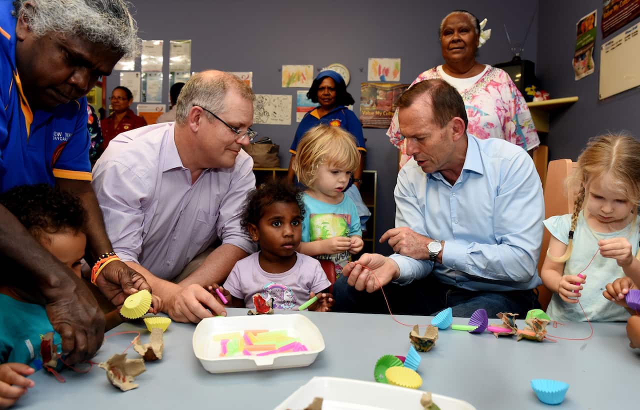 Prime Minister Tony Abbott and then-social services minister Scott Morrison during a visit to the Torres Strait Islands.