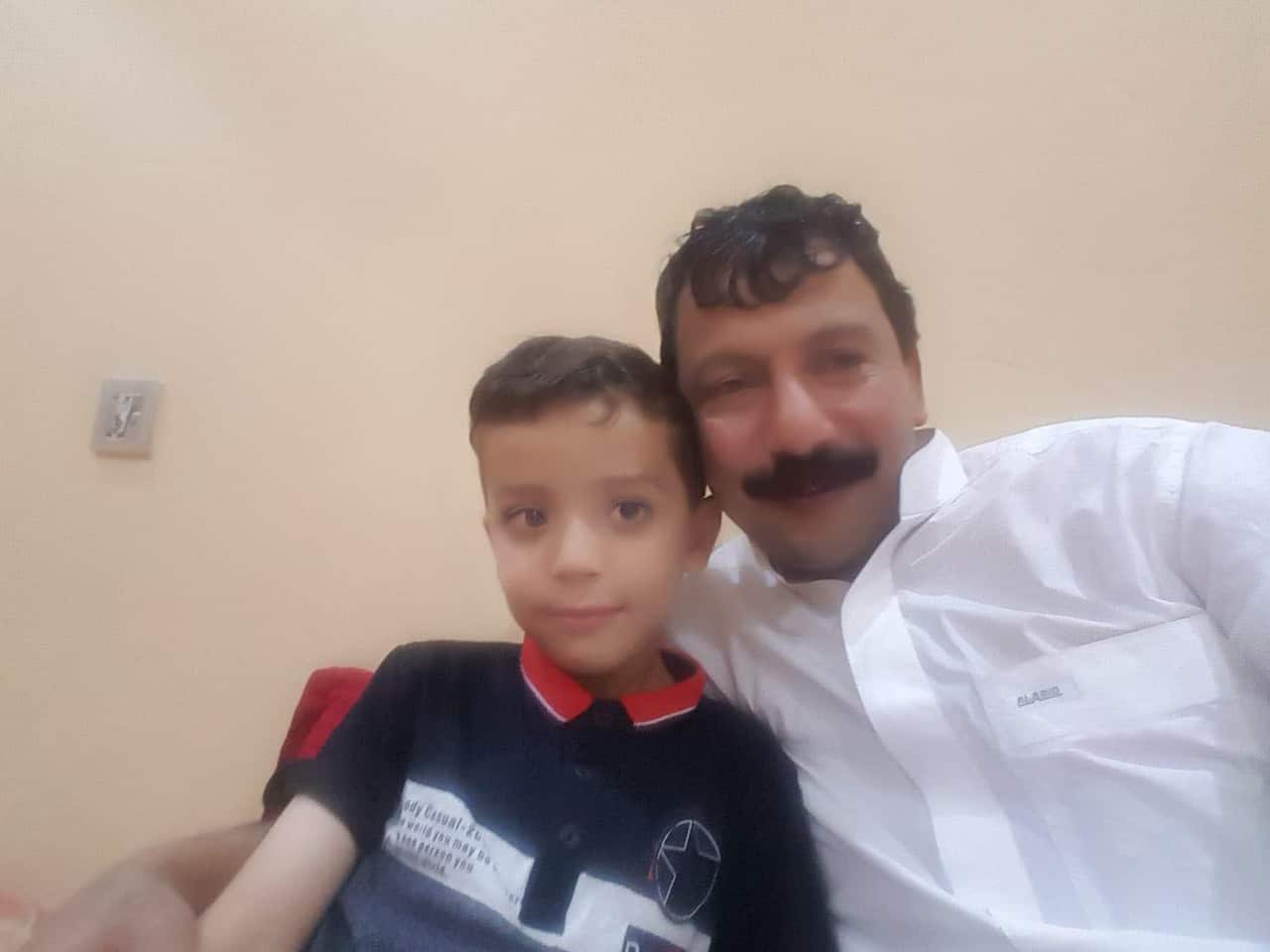 Mr Hanafi and his son who he hasn't seen for years.