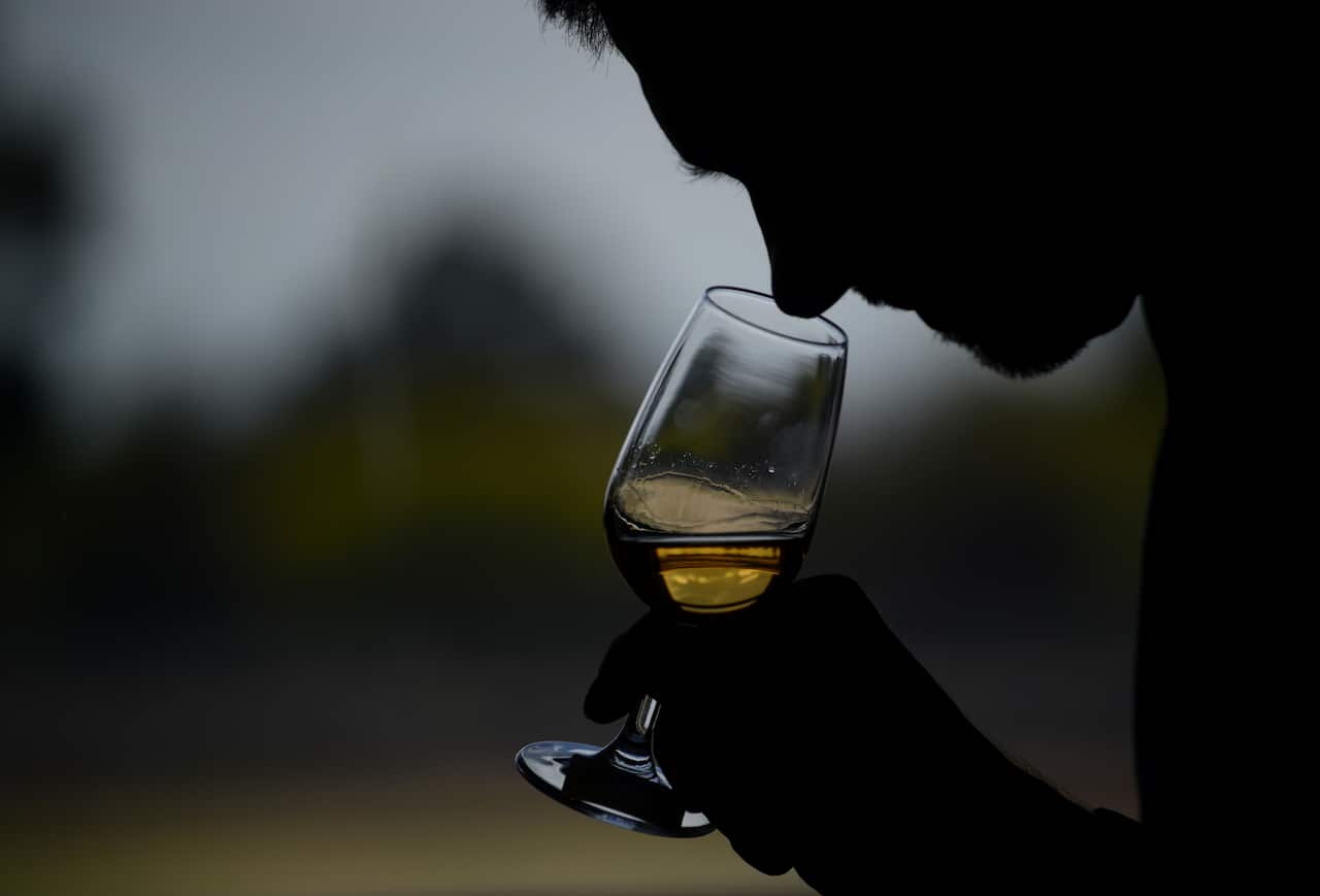 A person drinking alcohol (AAP)