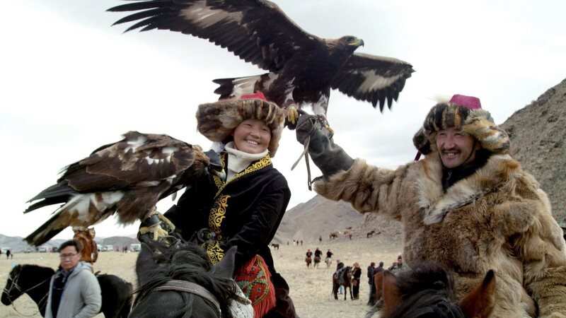 Resolve … Aisholpan takes part in the hunters’ festival.