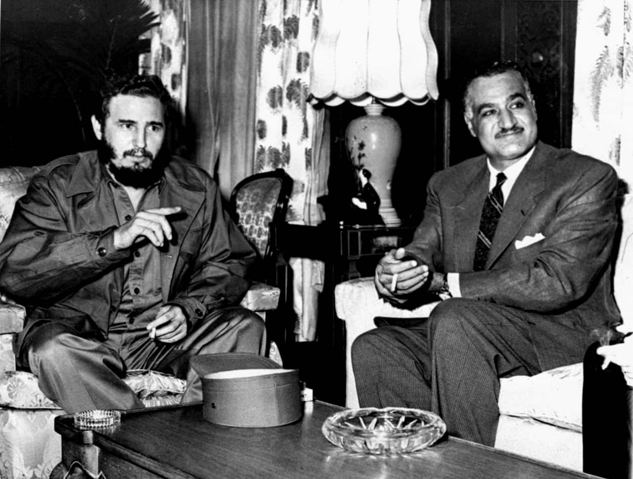 Cuba's Fidel Castro, left, and Gamal Abdel Nasser, President of United Arab Republic, confer, September 28, 1960 at the New York headquarters of the UAR.  (AP Photo)