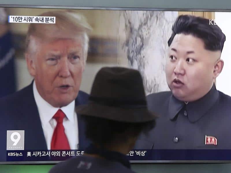 A TV showing US President Donald Trump and North Korea's Kim Jong Un