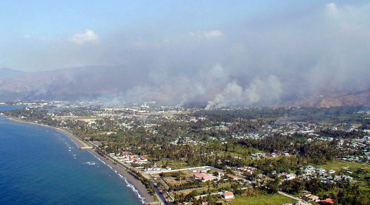 An aerial picture of East Timorese capital of Dili billowing smokes after militias setting fires, Thursday, Sept 9, 1999.