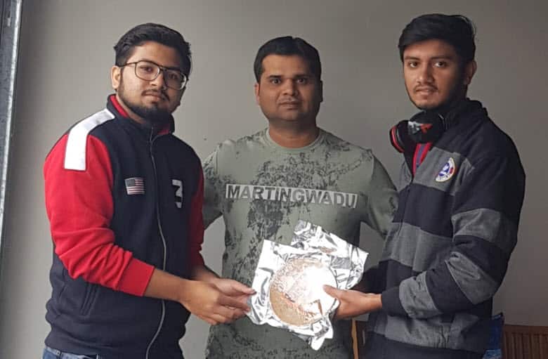 Melborune based Gujarati helpline distributes food packets to the needy.