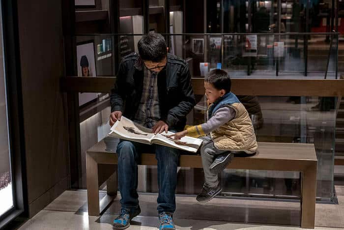 A father and son read picture book in the Suzhou Eslite