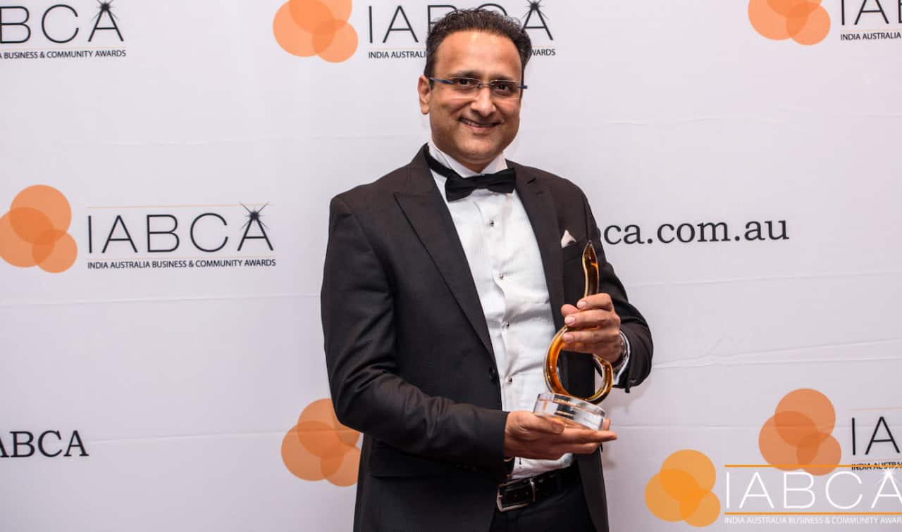 Mrudul Vasavada with the excellence in innovation award.