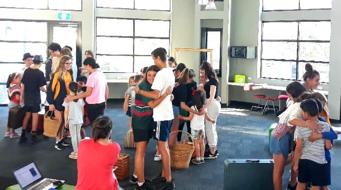 At the play rehearsals. 