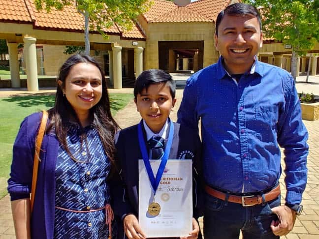 Ansh with his parents.