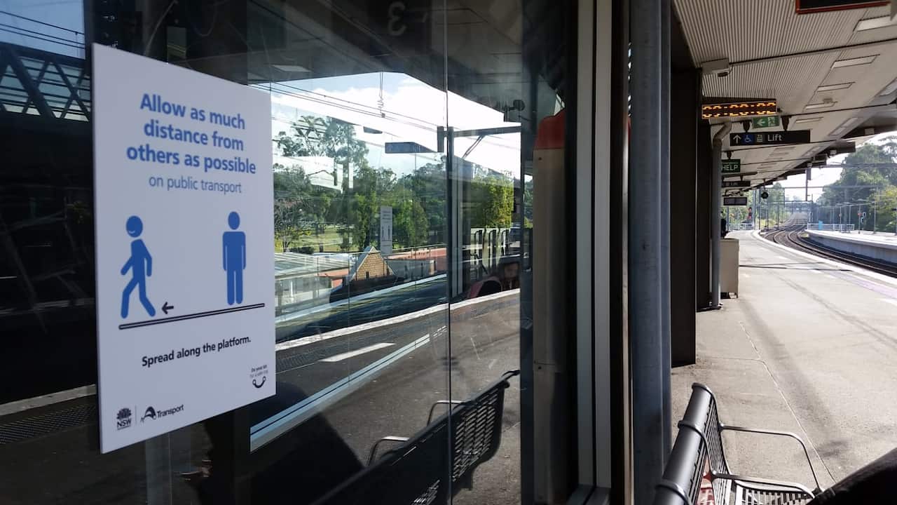 notice on train platform to remind commuters