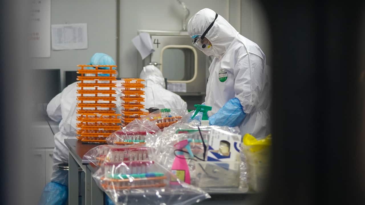 Medical workers at a coronavirus detection lab in Wuhan in central China's Hubei Province.