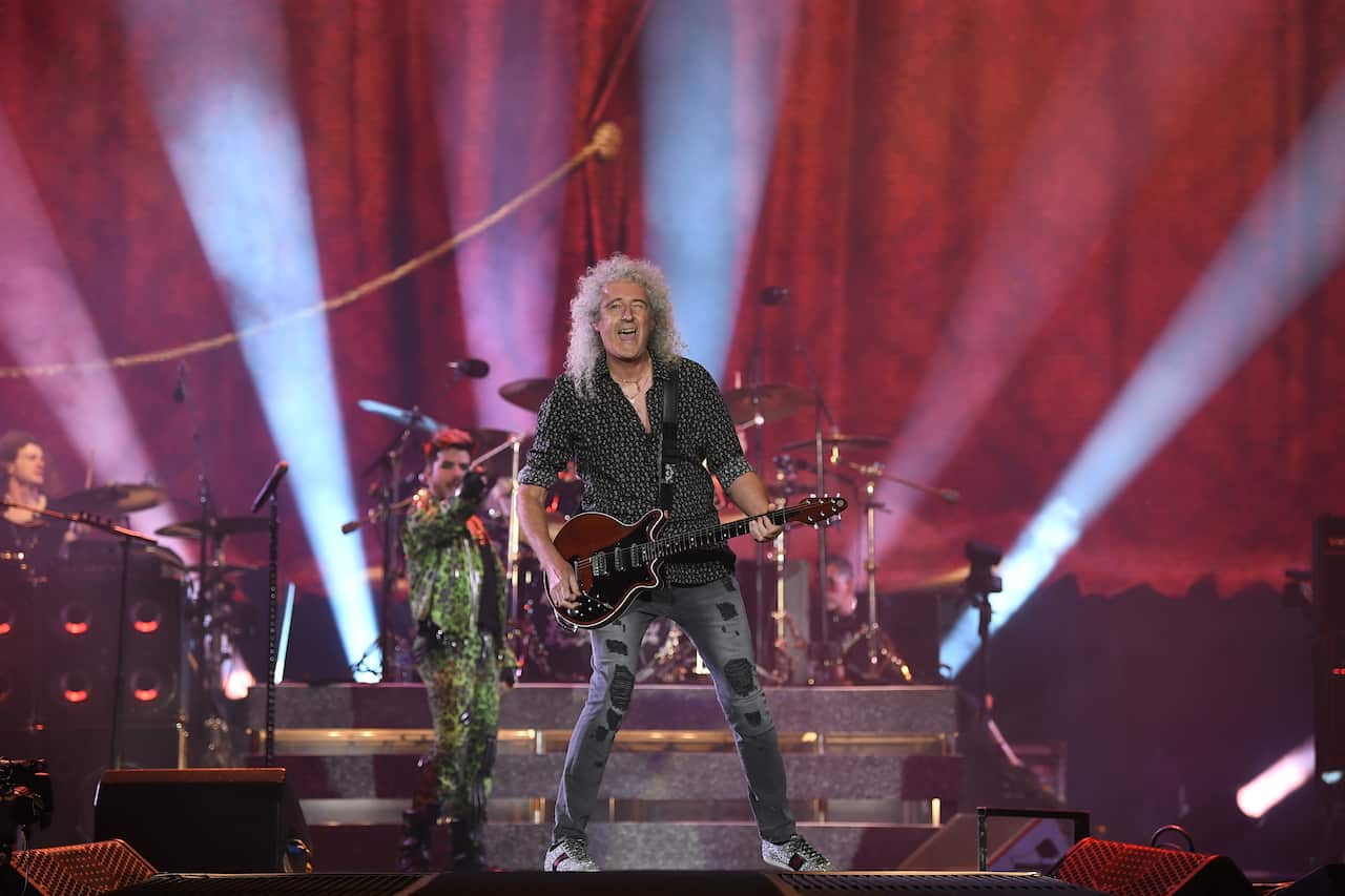 Brian May of Queen performs alongside frontman Adam Lambert.