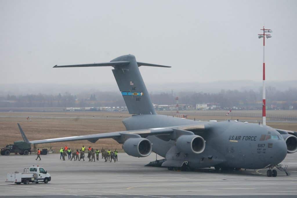 A US Air Force transport plane transporting military equipment and troops is unloaded at the Rzeszow-Jasionka airport in southeastern Poland, on 6 February 2022.