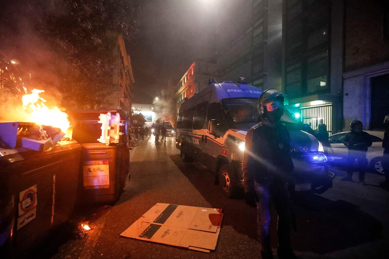 Police clash with protesters in Rome, Italy