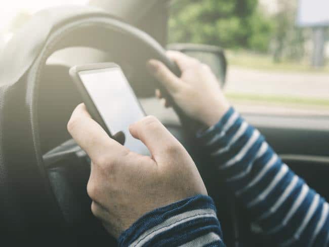 Provisional drivers caught using their mobile phones while driving.