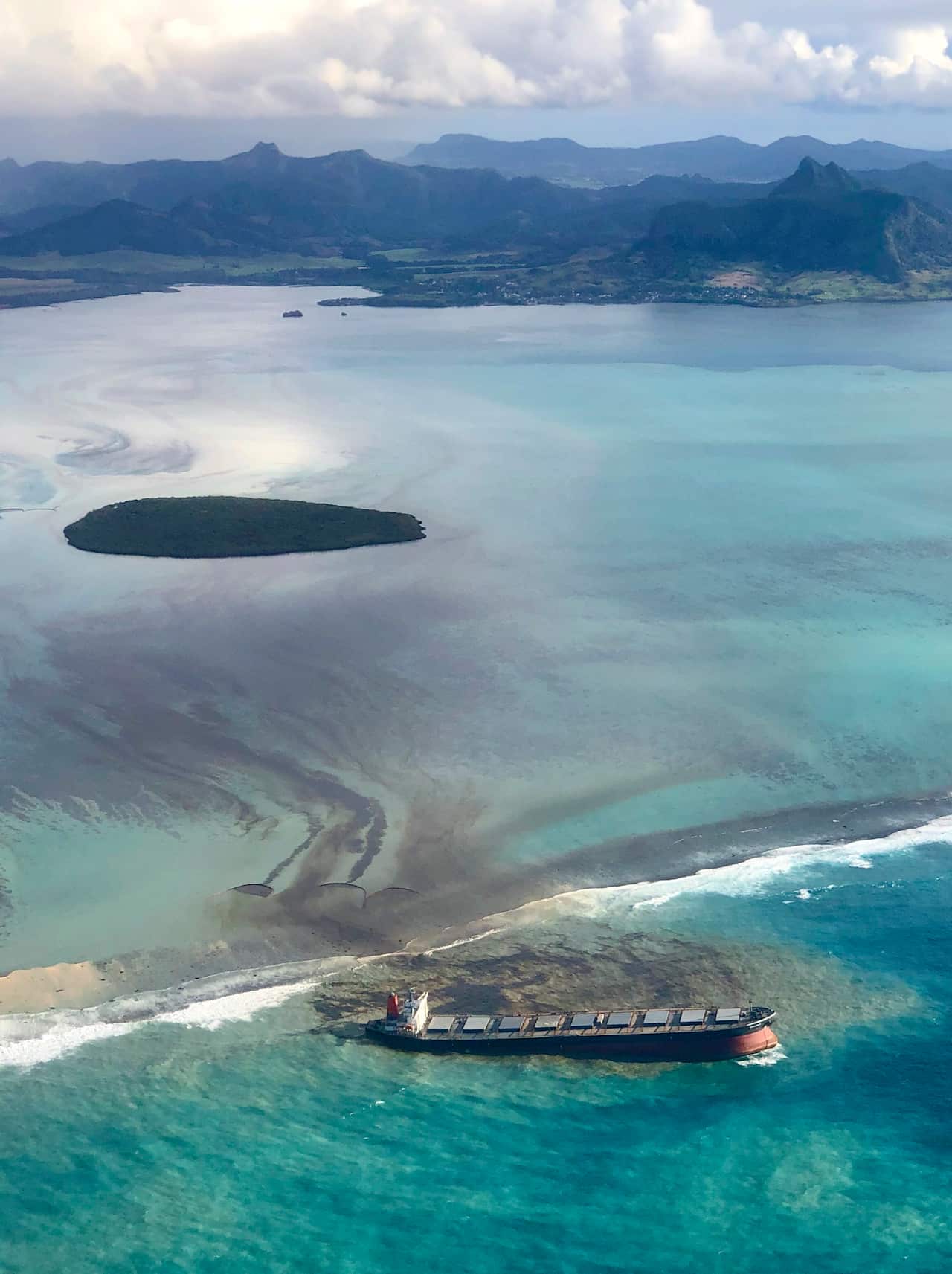 Oil leaking from the MV Wakashio, a bulk carrier ship that recently ran aground off the southeast coast of Mauritius.