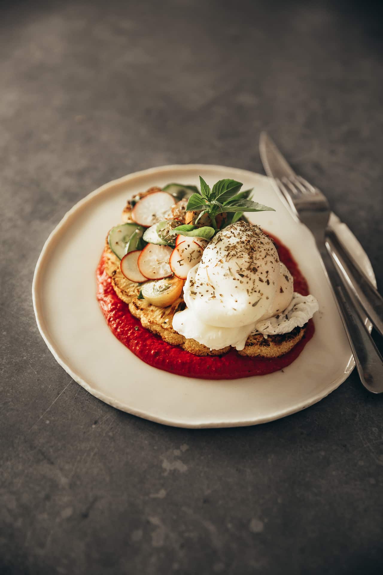 Cauliflower steak with beet hummus