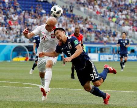 Japan, seeking a point, level 0-0 at halftime v Poland