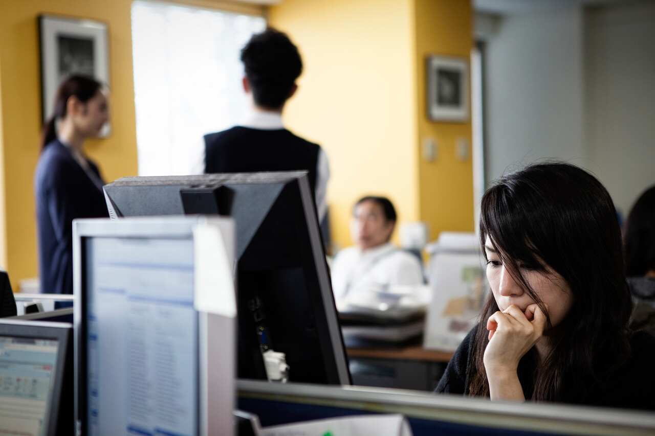 Businessmen working on a computer in the office
