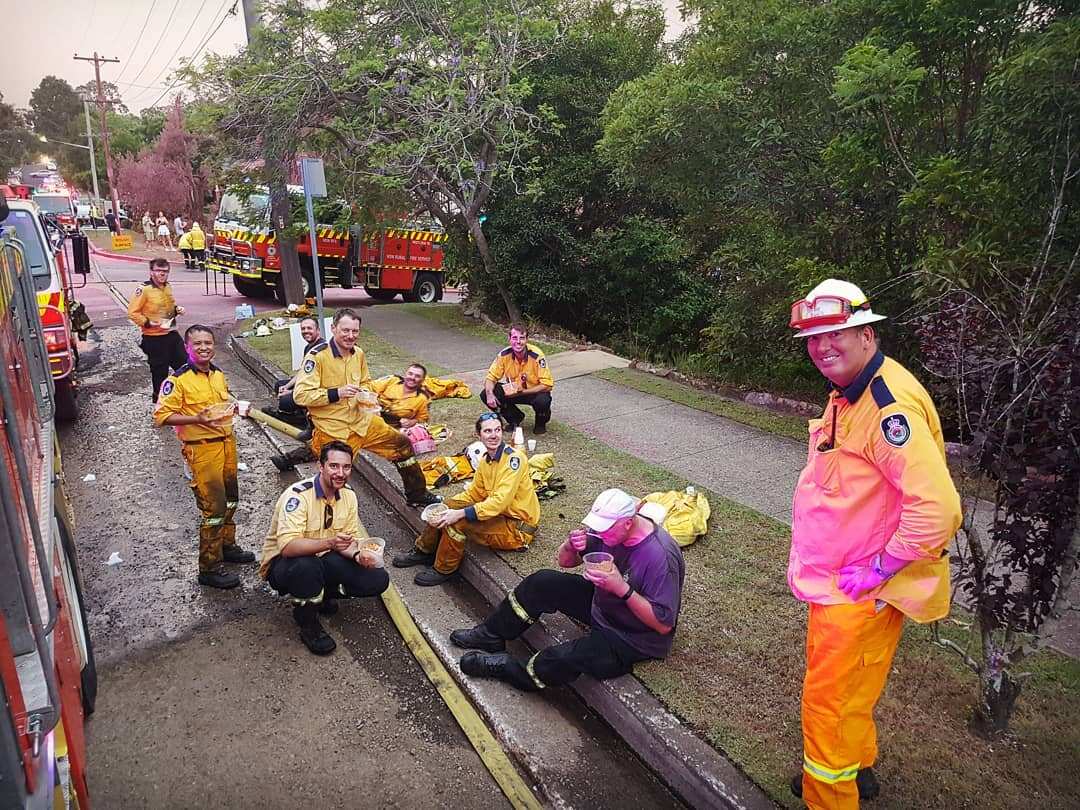 Volunteer firefighters from the Hornsby Rural Fire Service enjoy a home-cooked meal courtesy of the local Sikh temple.