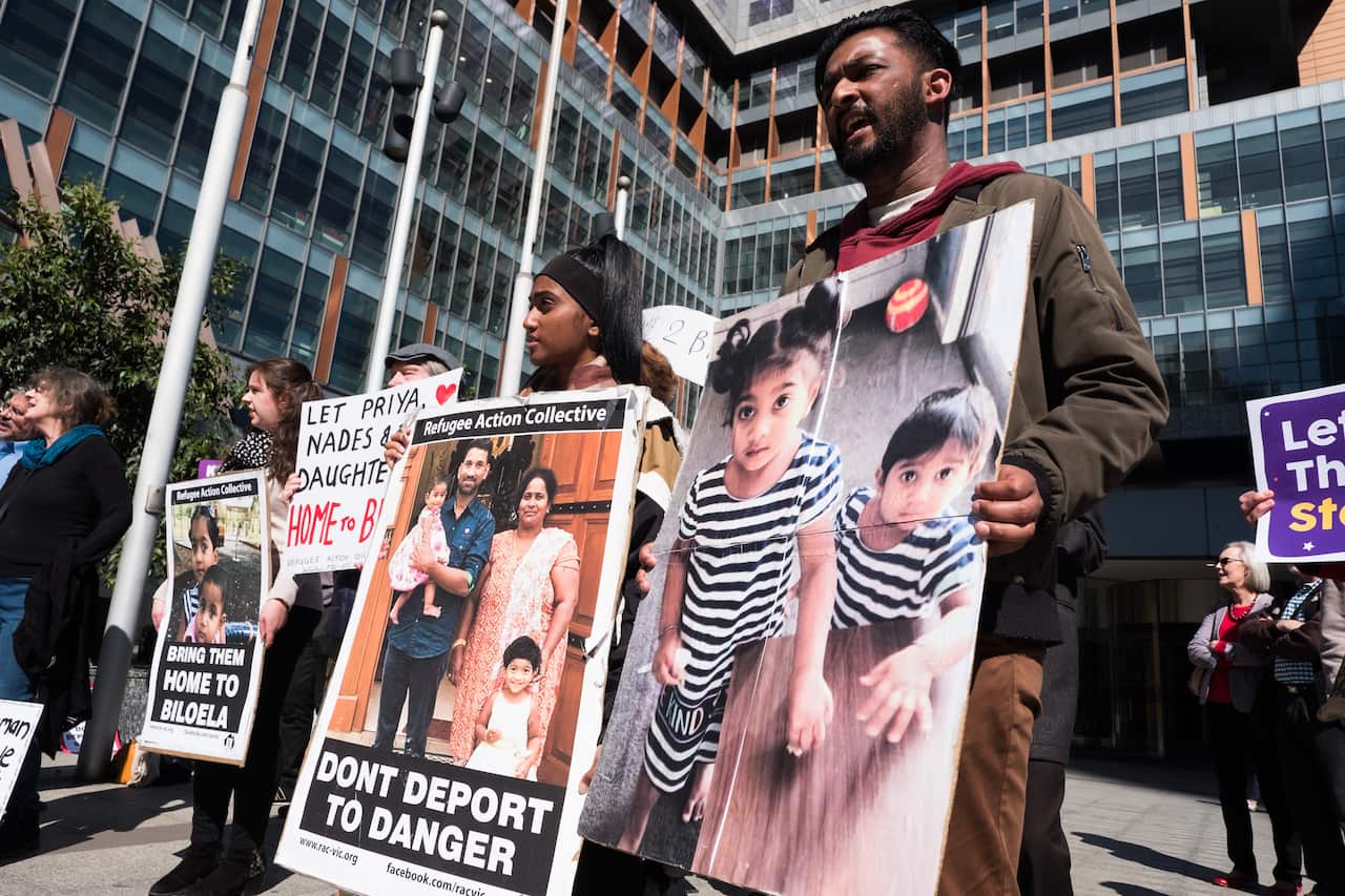 Protestors support the Tamil Biloela family in 2019. Refugee advocates are urging DFAT to retract a report they say is used to undermine Tamil protection claims