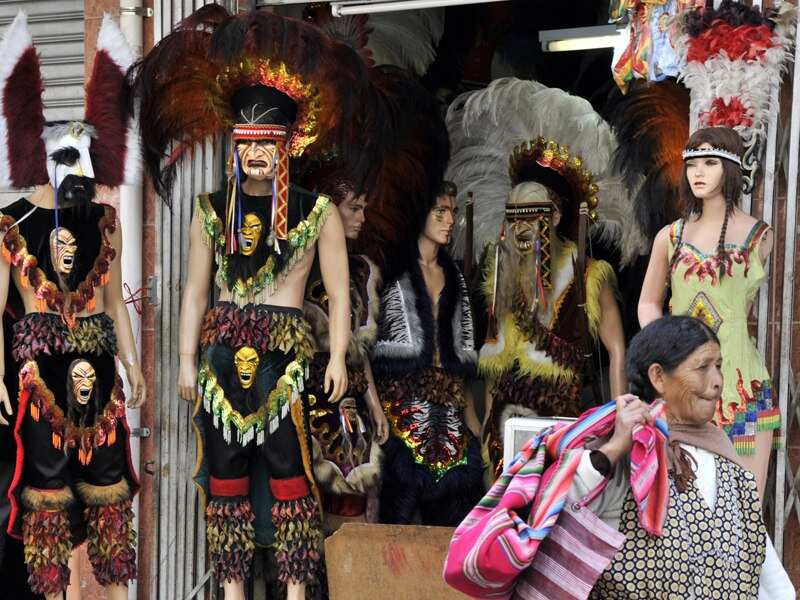 A street stall sells diverse accessories to be used by dancers during the opening of the Jesus del Gran Poder religious festival in La Paz, Bolivia. (Getty)