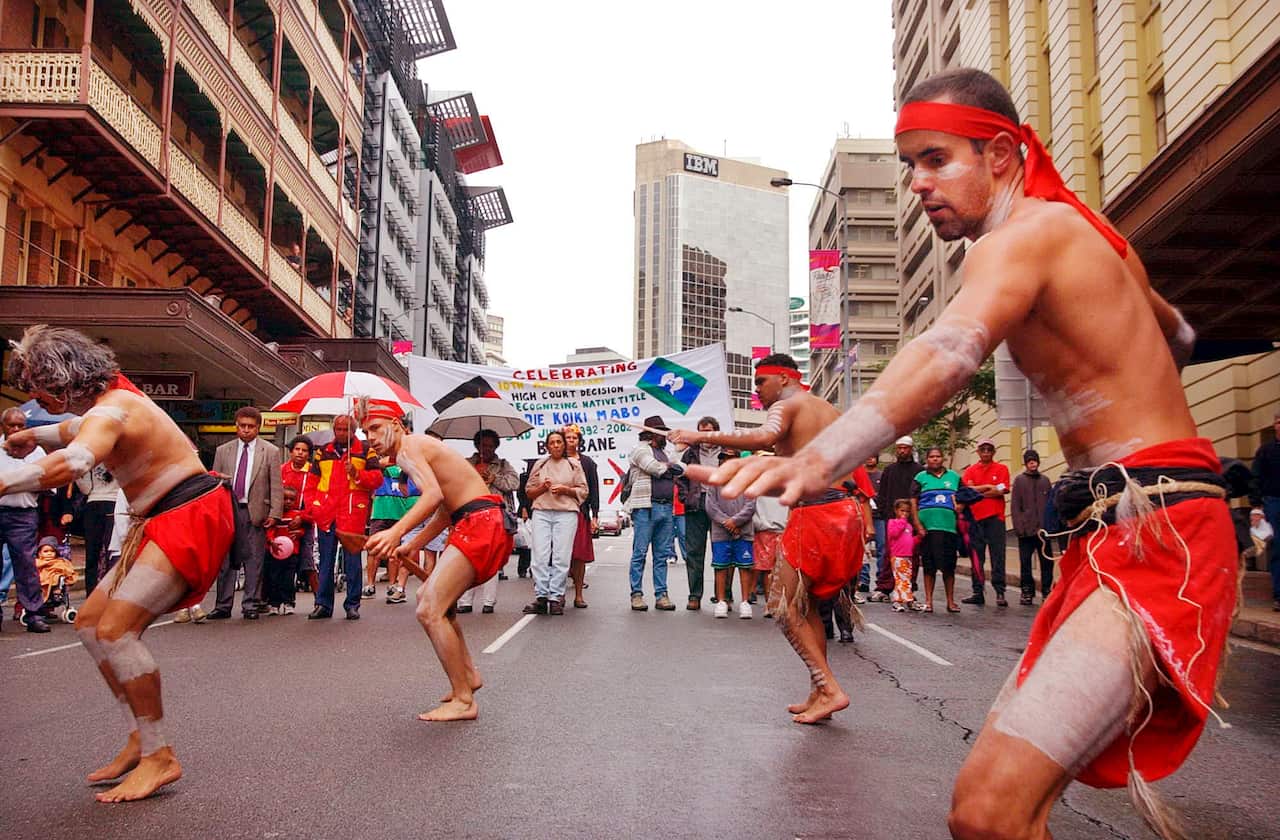 Brisbane, June 3, 2002. Aboriginal dancers lead the march through the city to King George Square this morning. Queensland indigenous elders today called for a new era of change towards reconciliation as they marked the 10th anniversary of the landmark Mab