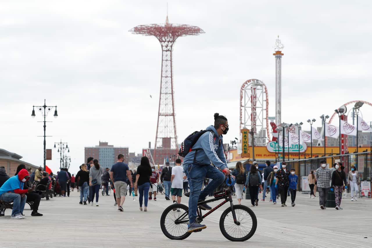 A crowded Coney Island boardwalk in New York on Sunday afternoon.