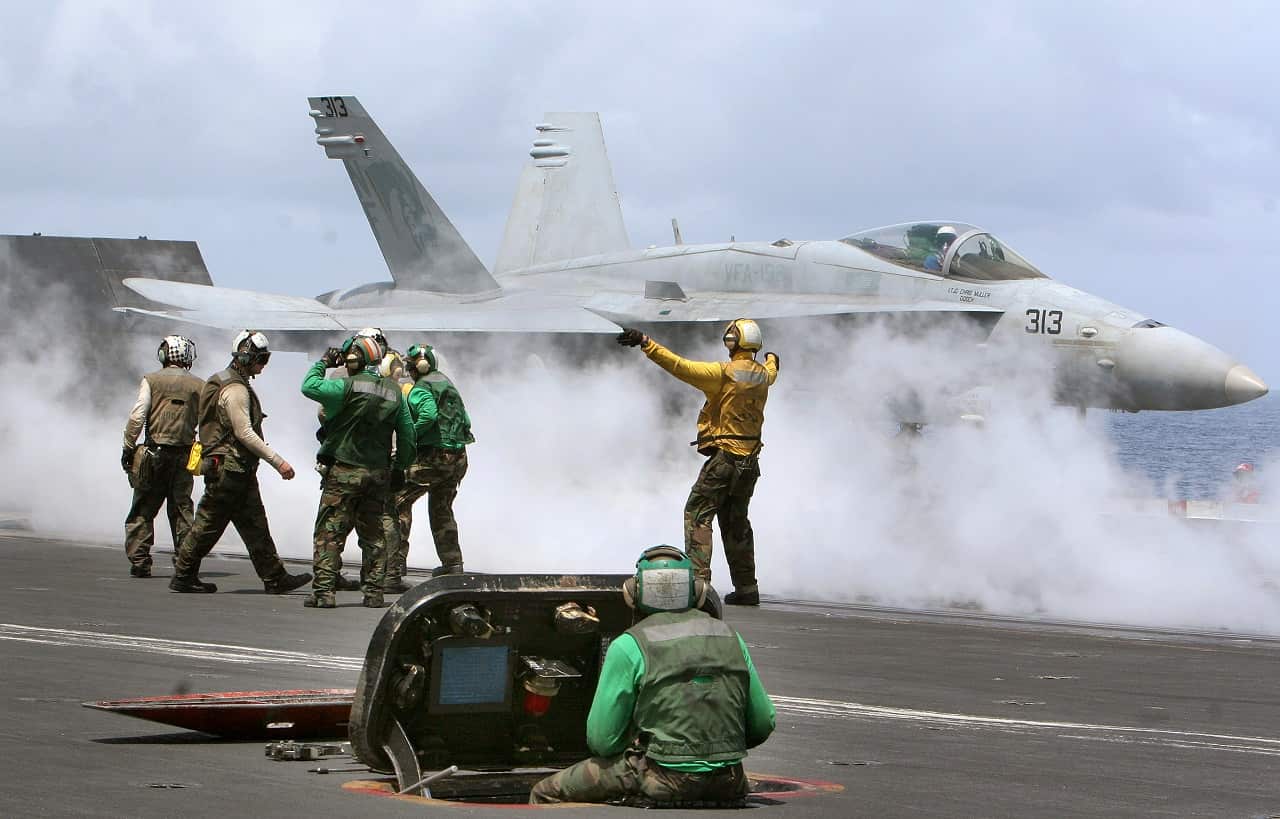 Crew aboard USS Kitty Hawk CV63 during Exercise Malabar 2007, in the waters of the Bay of Bengal.