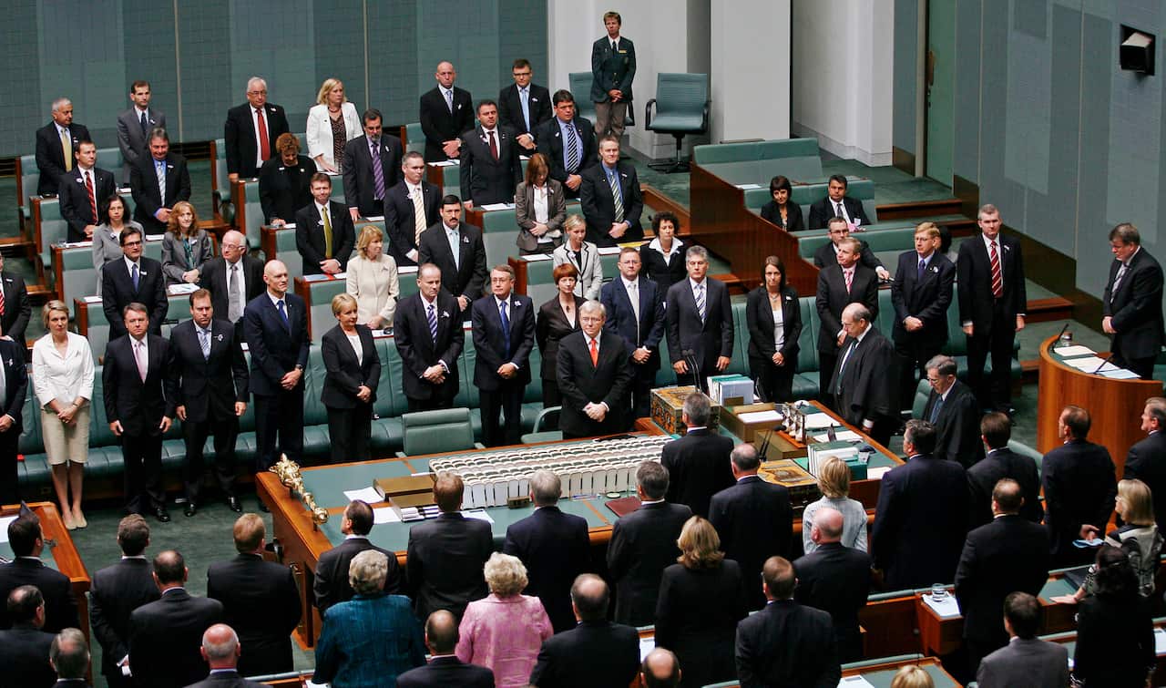 Australian Prime Minister Kevin Rudd delivers an apology to the Aboriginal people for injustices committed over two centuries of white settlement 