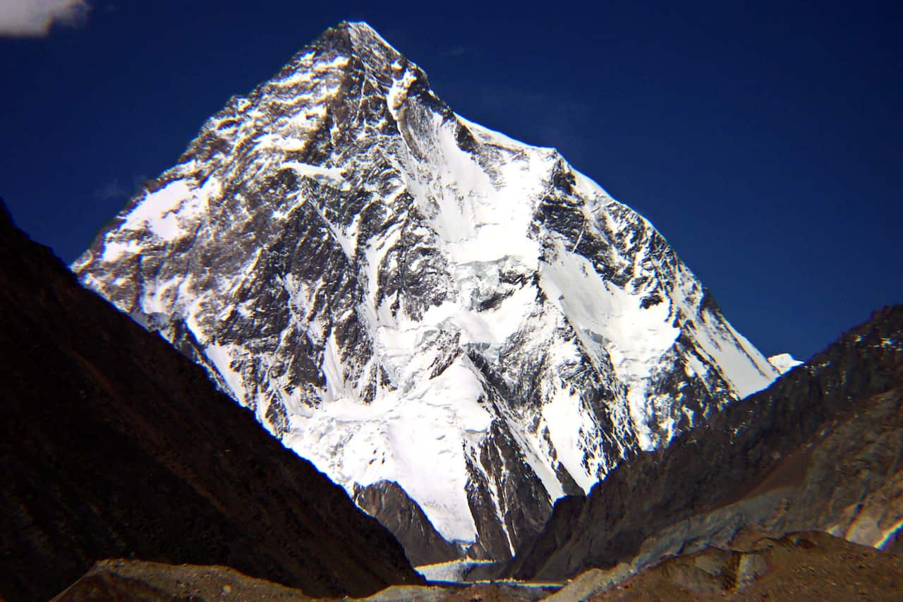 **FILE** Undated file photo provided by the Pakistan Tourism Office in Islamabad July 26 2004,  shows the world's second tallest peak K-2 in northern area of Pakistan. A Pakistani tour operator says nine climbers are feared to have died in an avalanche af