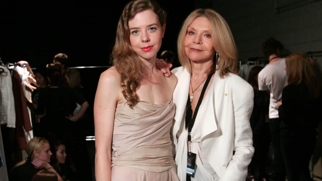 Fashion designers Bianca Spender (left) and her mother Carla Zampatti pose ahead of their fashion show on day three of Australian Fashion Week 2010 