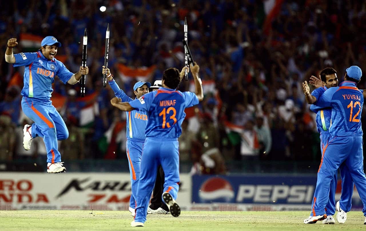 India celebrate after beating Pakistan during the 2nd semi-final match of the ICC Cricket World Cup 2011, in Mohali, India, 30 March 2011.