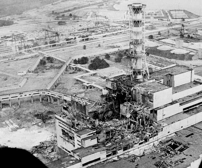 An aerial view of the Chernobyl nuclear power plant two to three days after the explosion. In front of the chimney is the destroyed fourth reactor. (AAP)