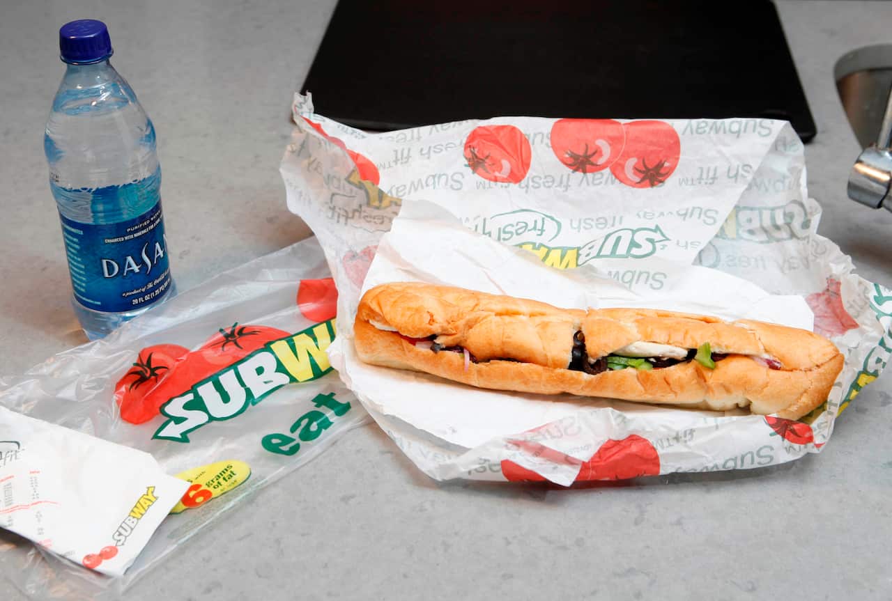 FILE - This Aug. 11, 2009, file photo, shows a chicken breast sandwich and water from subway on a kitchen counter in New York. Subway, the world's largest fast food chain, is facing criticism after an Australian man posted a picture on the company's Faceb