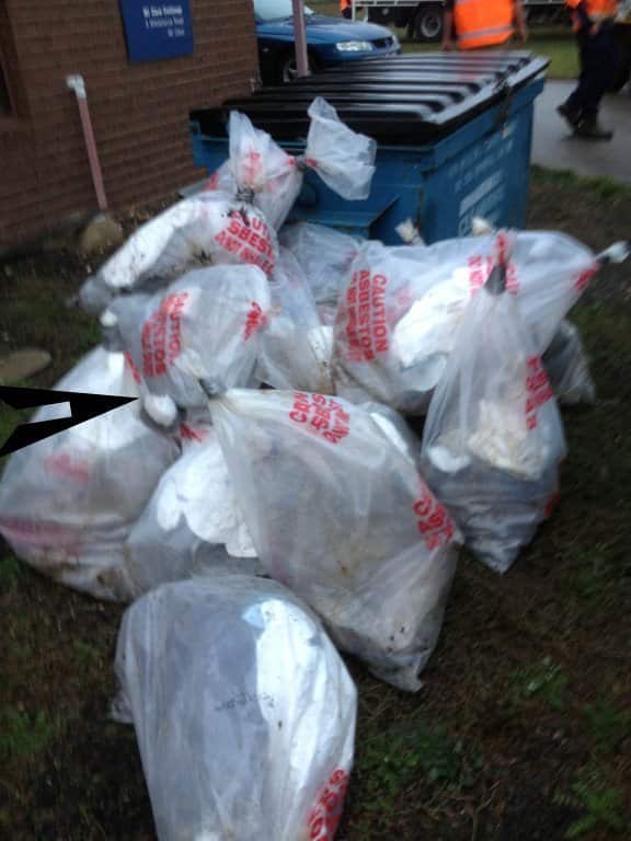 Supplied image obtained Friday, May 31, 2013 of bagged asbestos, one of which was split, at Mount Clear in Melbourne, Friday, May 24, 2013. (AAP Image/CEPU) NO ARCHIVING, EDITORIAL USE ONLY