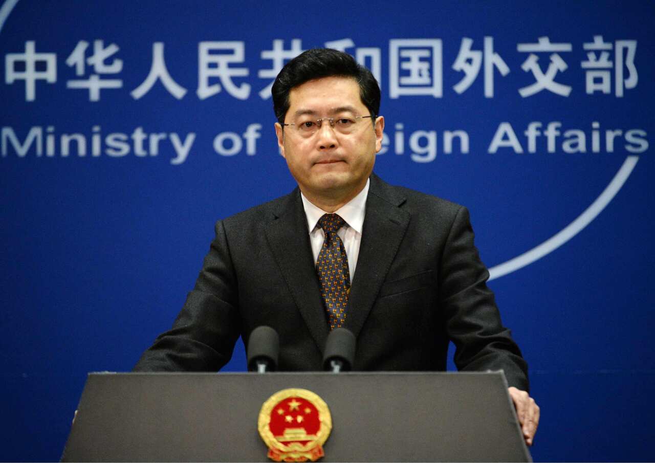 Former Chinese Foreign Ministry spokesman Qin Gang holds a press conference at the ministry in Beijing on Dec. 26, 2013.