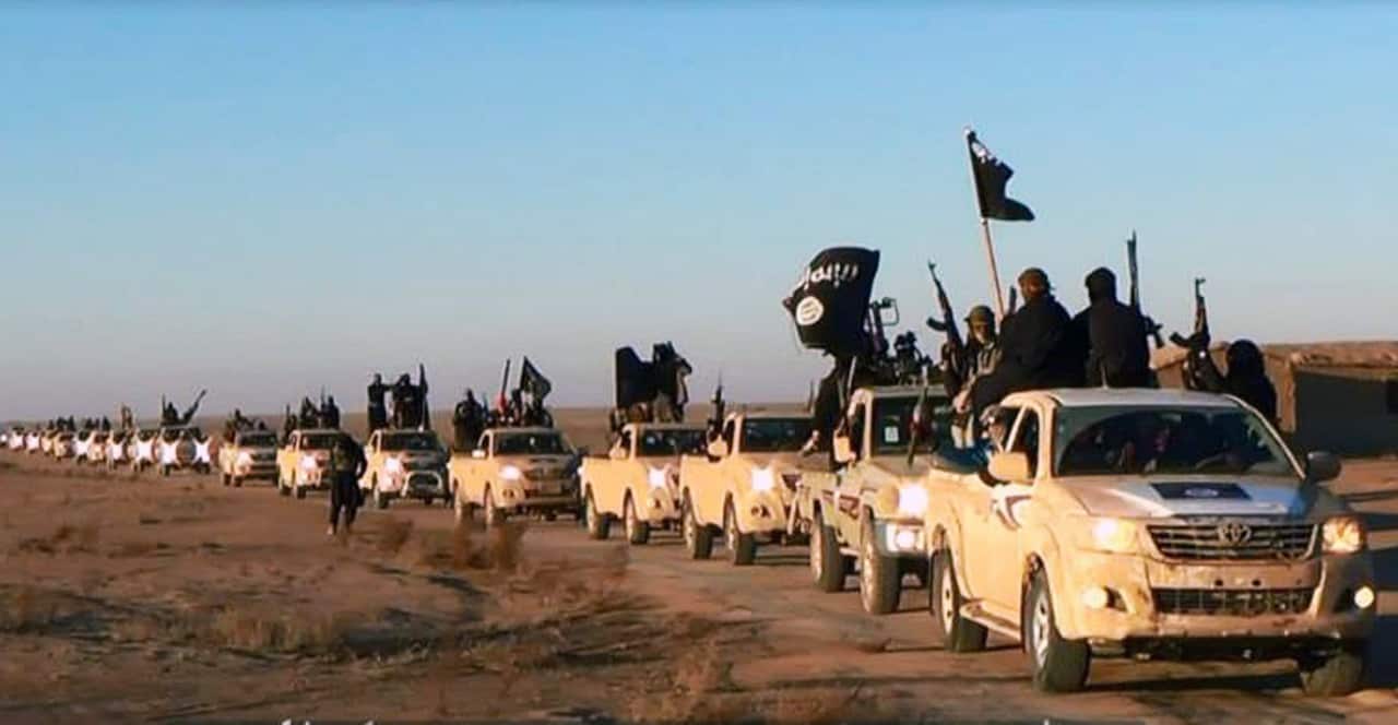 A convoy of vehicles & fighters from the al-Qaida-linked Islamic State of Iraq and the Levant, now called the Islamic State group, Anbar Province,Iraq. 7/1/14