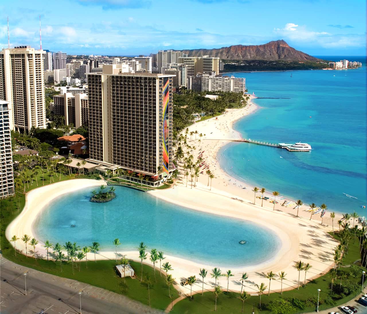 The newly restored Duke Kahanamoku Lagoon adjacent to the Hilton Hawaiian Village at Waikiki has pumps that turn over the water five times a day. In the distance is Diamond Head. (AAP Image/Hilton Hawaii) NO ARCHIVING, EDITORIAL USE ONLY