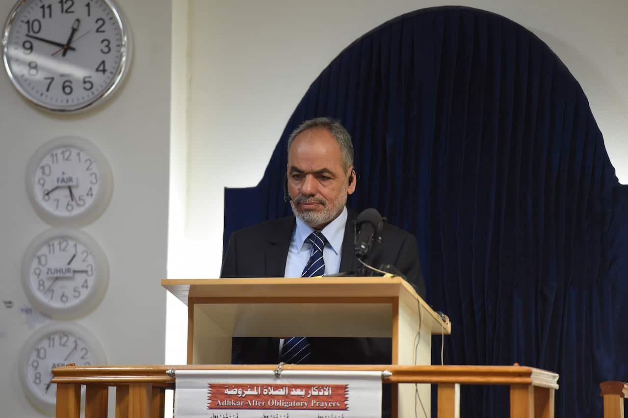 Parramatta Mosque chairman Neil El-Kadomi speaks to worshippers at Parramatta Mosque during a Friday prayer meeting, Friday, Oct. 9, 2015. Australia's Muslim community has rejected "deviant so-called religious teachings" in the wake of the murder of Curti