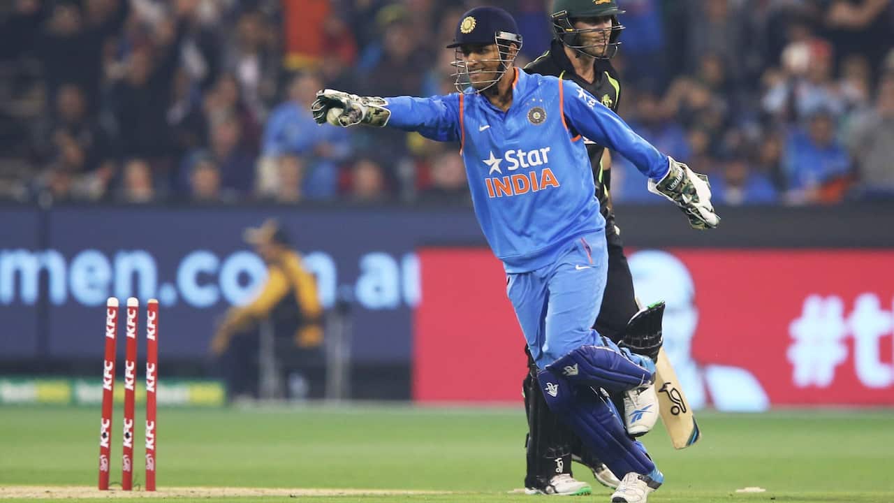 Indian wicketkeeper Mahendra Singh (MS) Dhoni celebrates after stumping Australian batsman Glenn Maxwell, Friday, Jan. 29, 2016. 