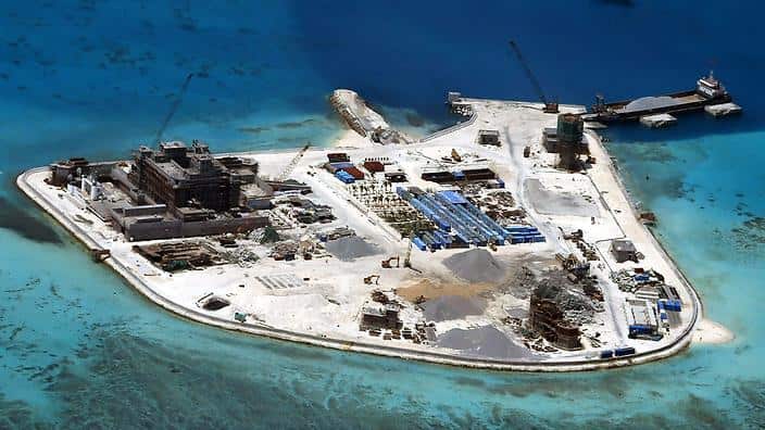 A file picture dated 11 May 2015 shows an areal view of alleged artificial islands built by China in disputed waters in the South China Sea. (AAP)